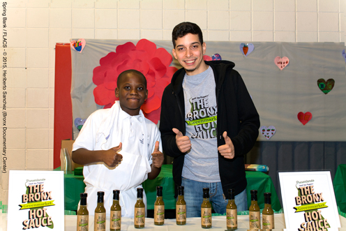 photo ~ at reception with samples of The Bronx Greenmarket Hot Sauce ~ Heriberto Sanchez ~ 2015-02-27 ~ Spring Bank presents Healthy Hearts ~ sputnyc